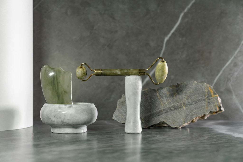 grey-and-green-gua-sha-and-face-roller